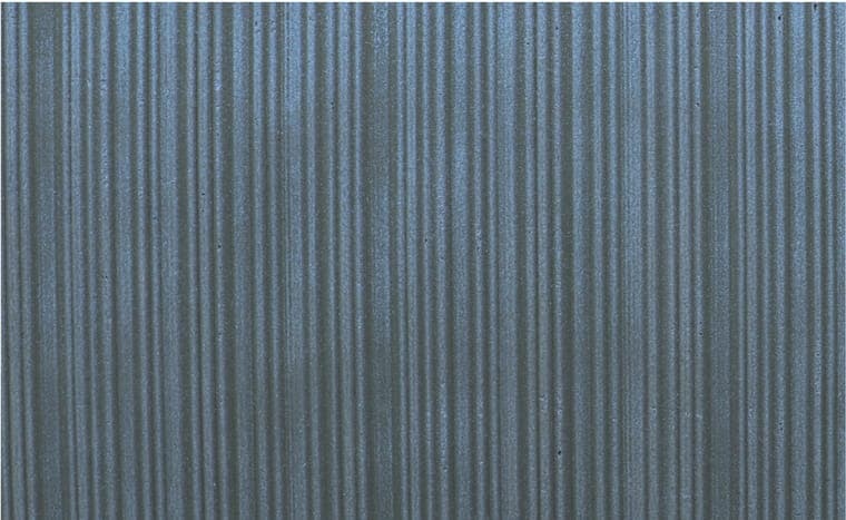 Liner Stone flexible clay cladding — fine vertical pinstripe, three tones
